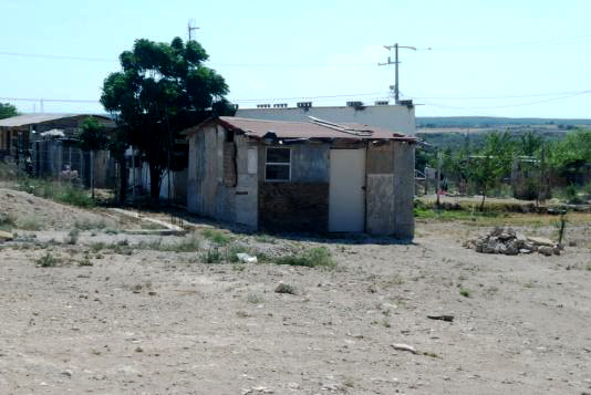 Steep paths and hills leading to homes in the colonias